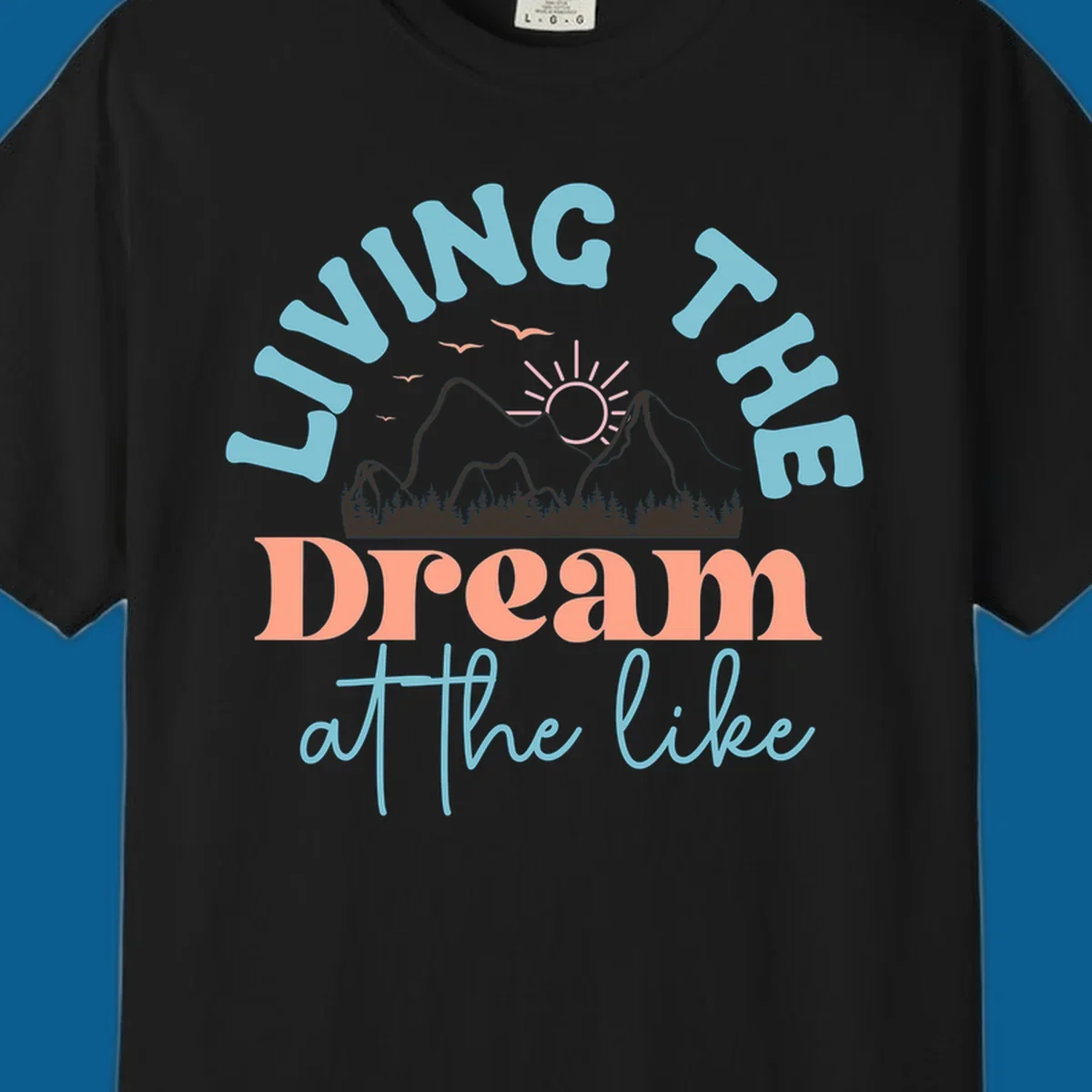 Illustration of mountains with a sunrise and birds above the text 'Living The Dream At The Like'.
