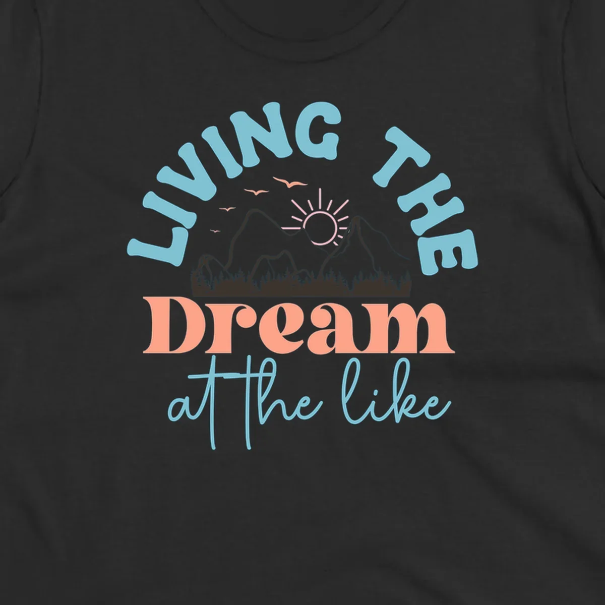 Illustration of mountains with a sunrise and birds above the text 'Living The Dream At The Like'.