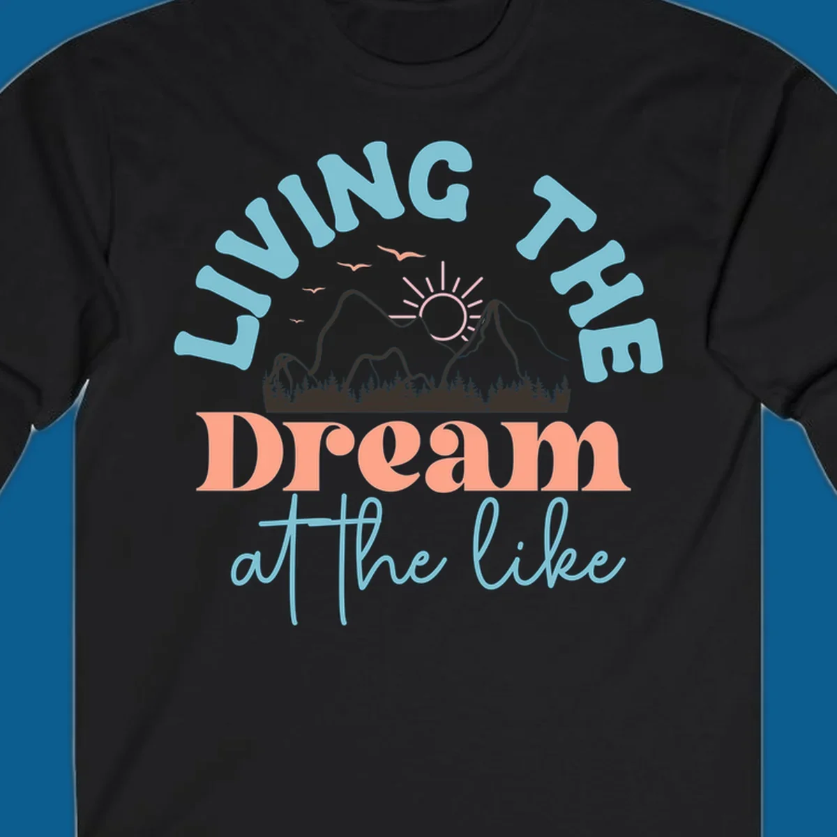 Illustration of mountains with a sunrise and birds above the text 'Living The Dream At The Like'.