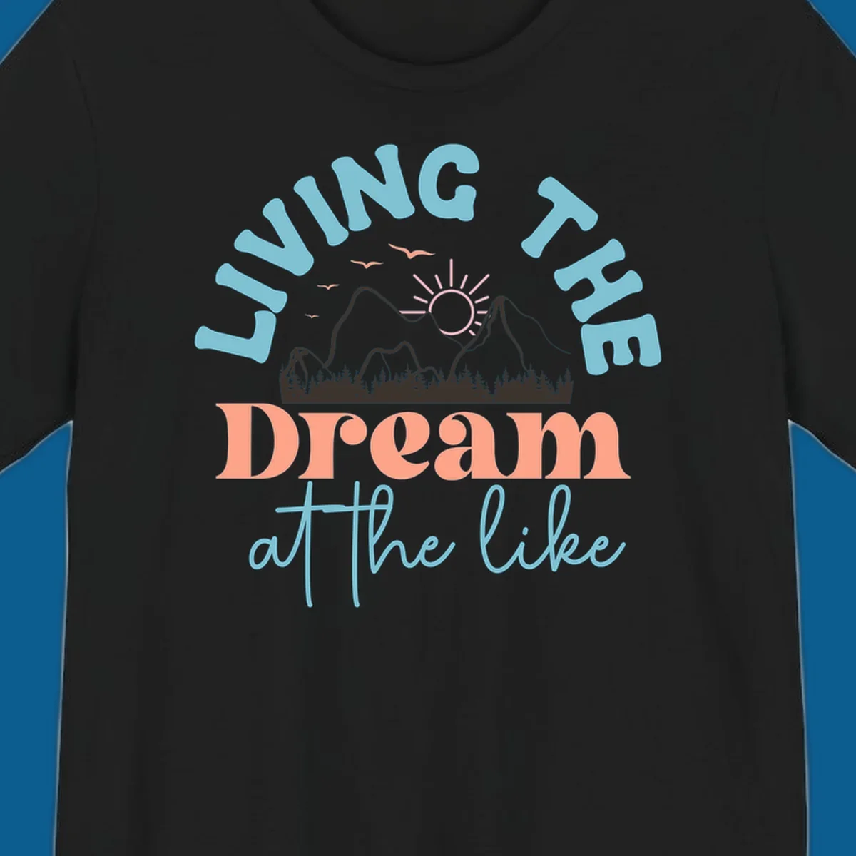 Illustration of mountains with a sunrise and birds above the text 'Living The Dream At The Like'.