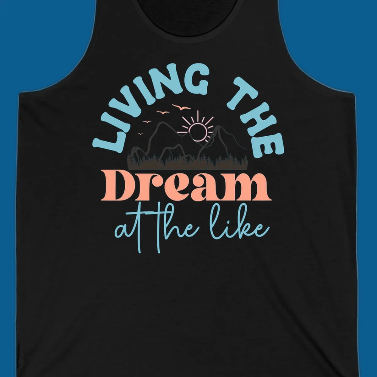 Illustration of mountains with a sunrise and birds above the text 'Living The Dream At The Like'.