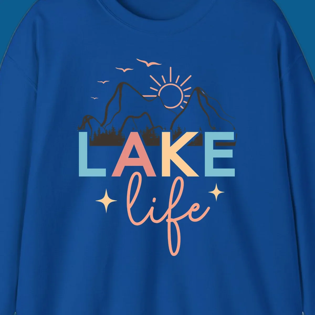 Lake life mountains graphic with colorful text and scenic background.