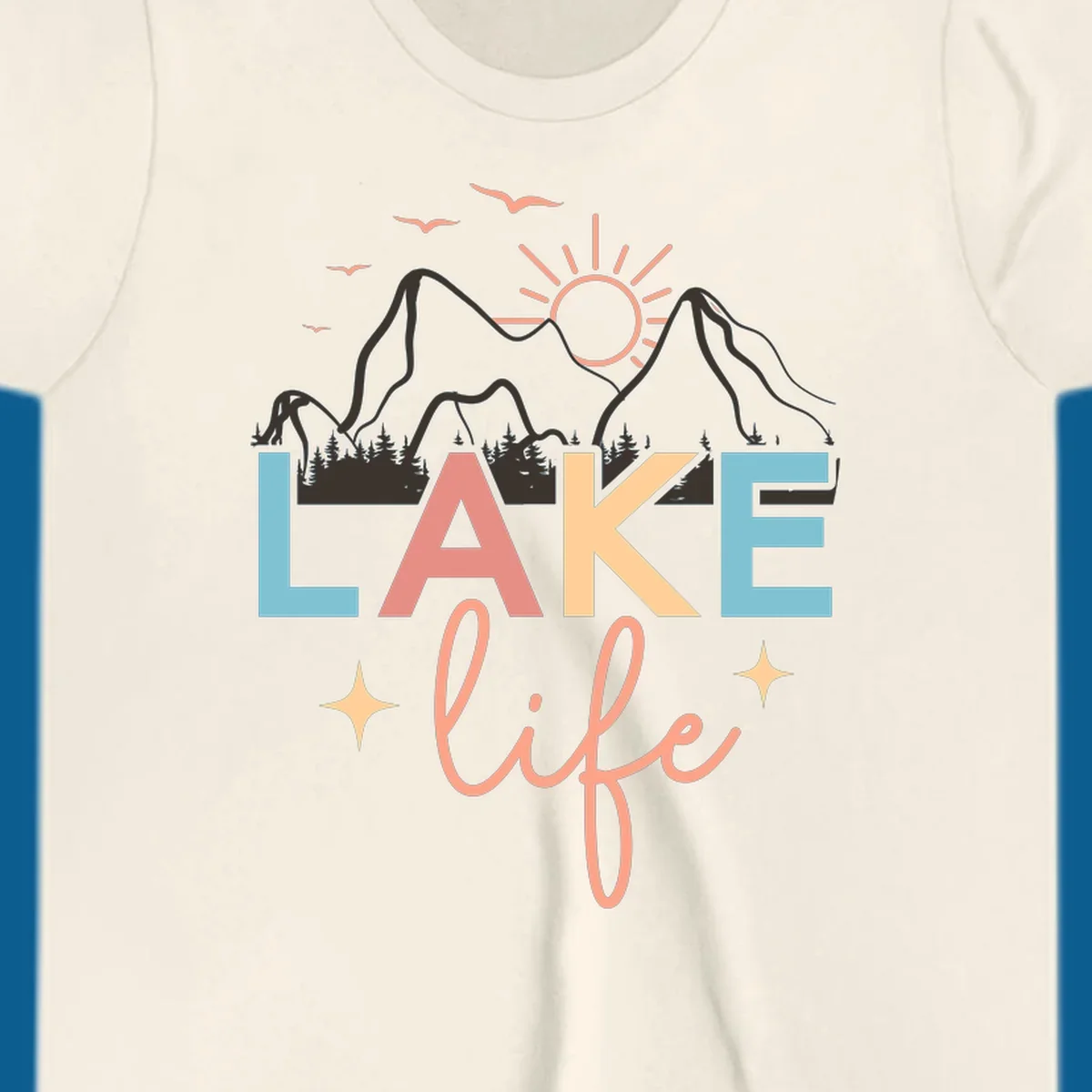Lake life mountains graphic with colorful text and scenic background.