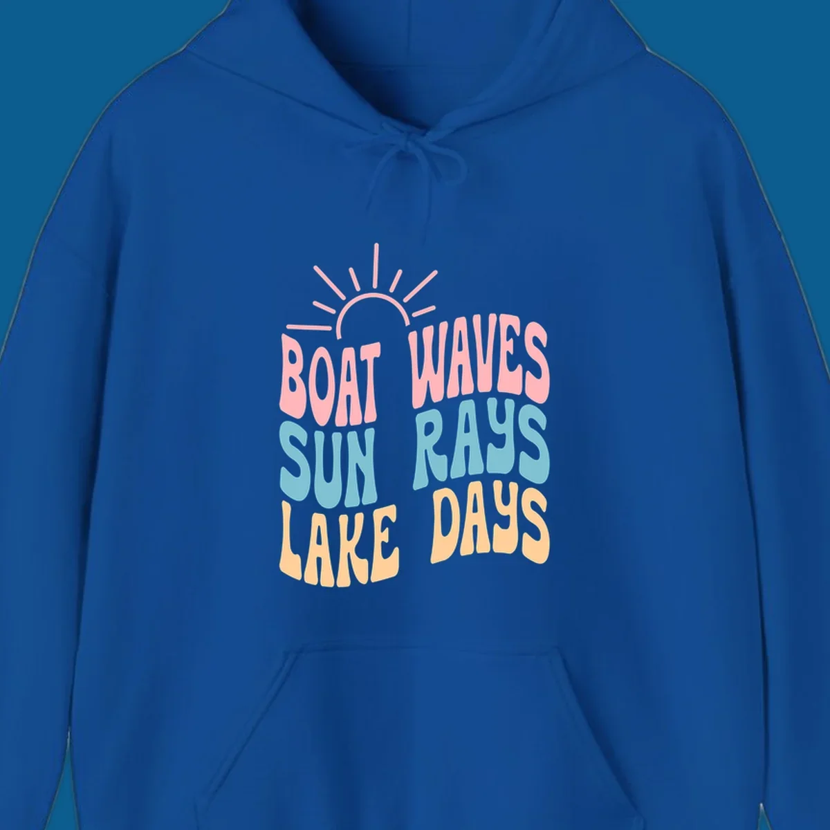 Retro text design featuring 'Boat Waves Sun Rays Lake Days' with sun rays.