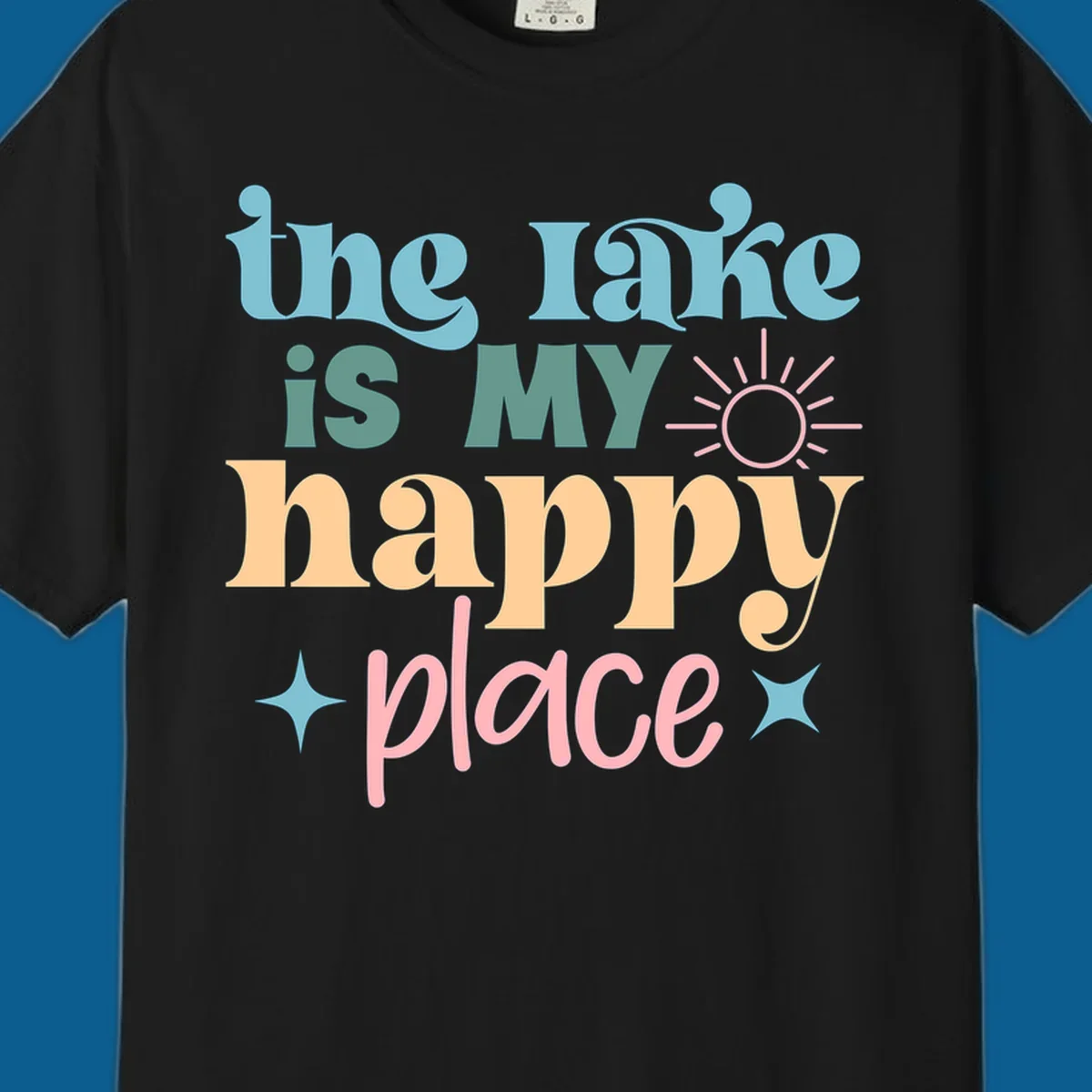 The lake is my happy place text with sun and starbursts, lake-happy-place design