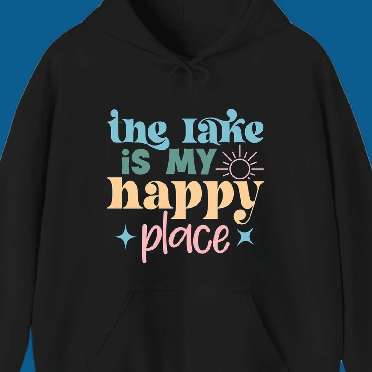 The lake is my happy place text with sun and starbursts, lake-happy-place design