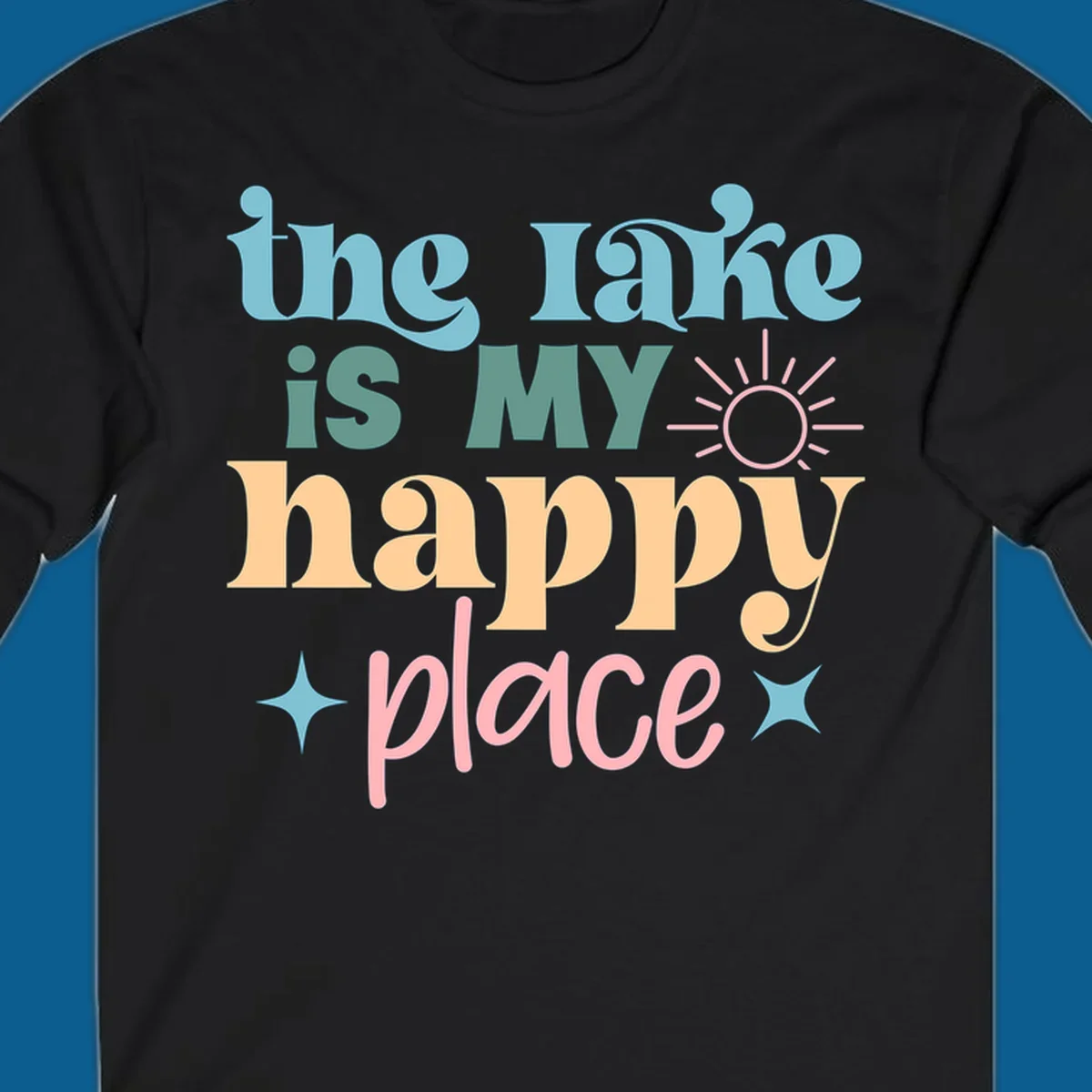 The lake is my happy place text with sun and starbursts, lake-happy-place design