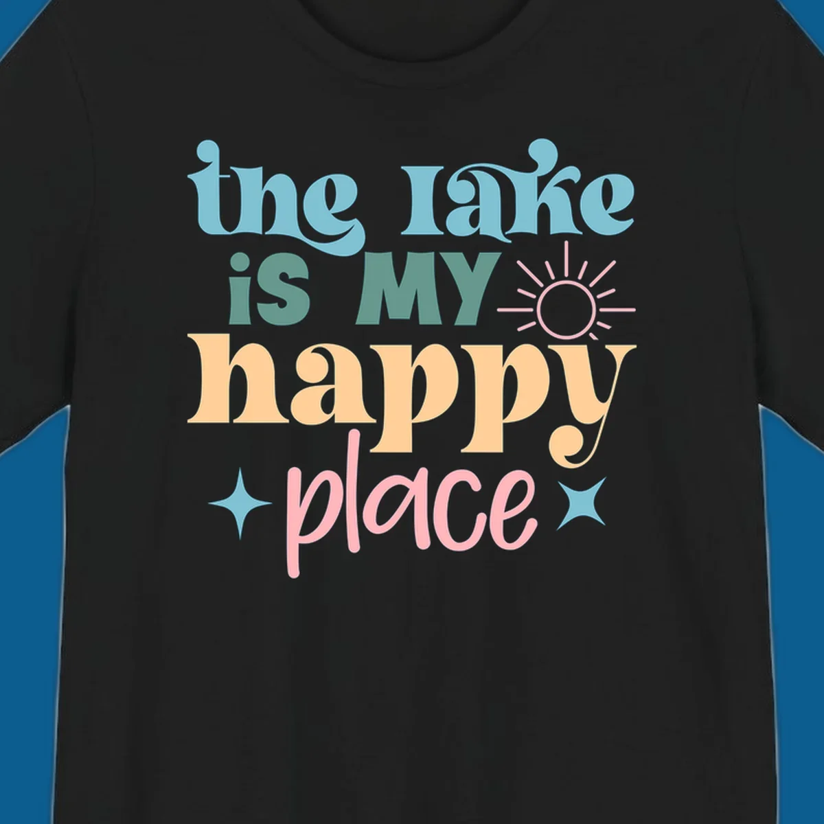 The lake is my happy place text with sun and starbursts, lake-happy-place design
