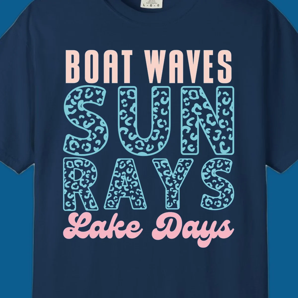 Boat waves sun rays lake days text design with pink and teal leopard print.