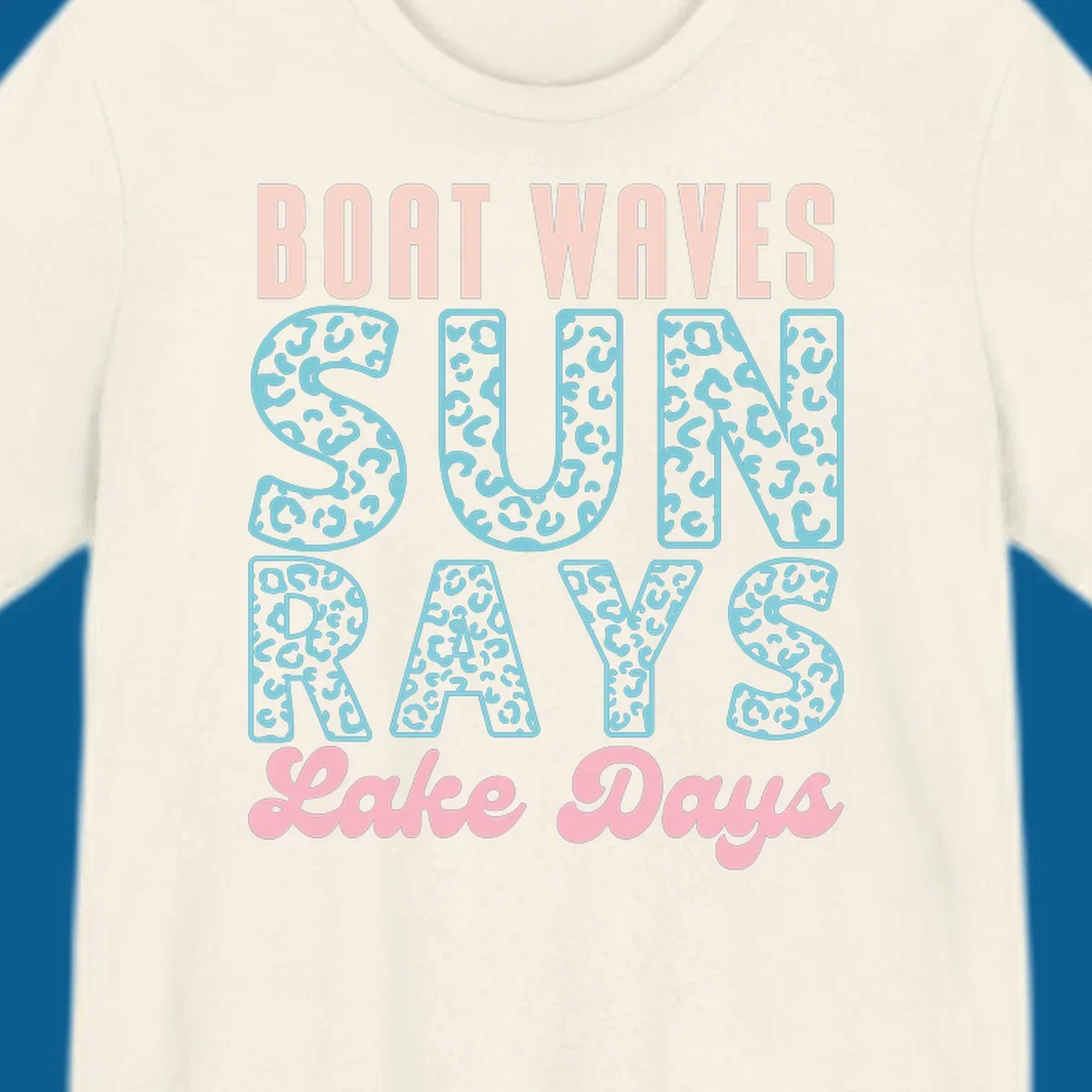 Boat waves sun rays lake days text design with pink and teal leopard print.