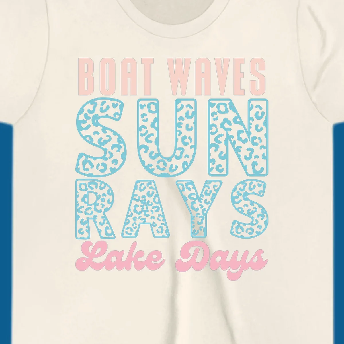 Boat waves sun rays lake days text design with pink and teal leopard print.