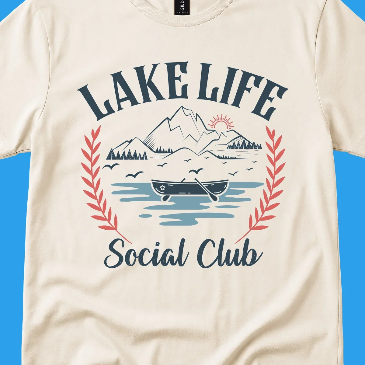 Lake life social club design with mountains, lake, canoe, and birds.
