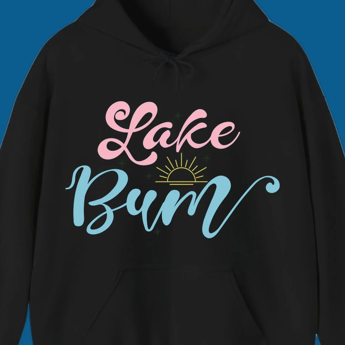 Lake Bum text design with a sunset graphic, in pink and blue script.