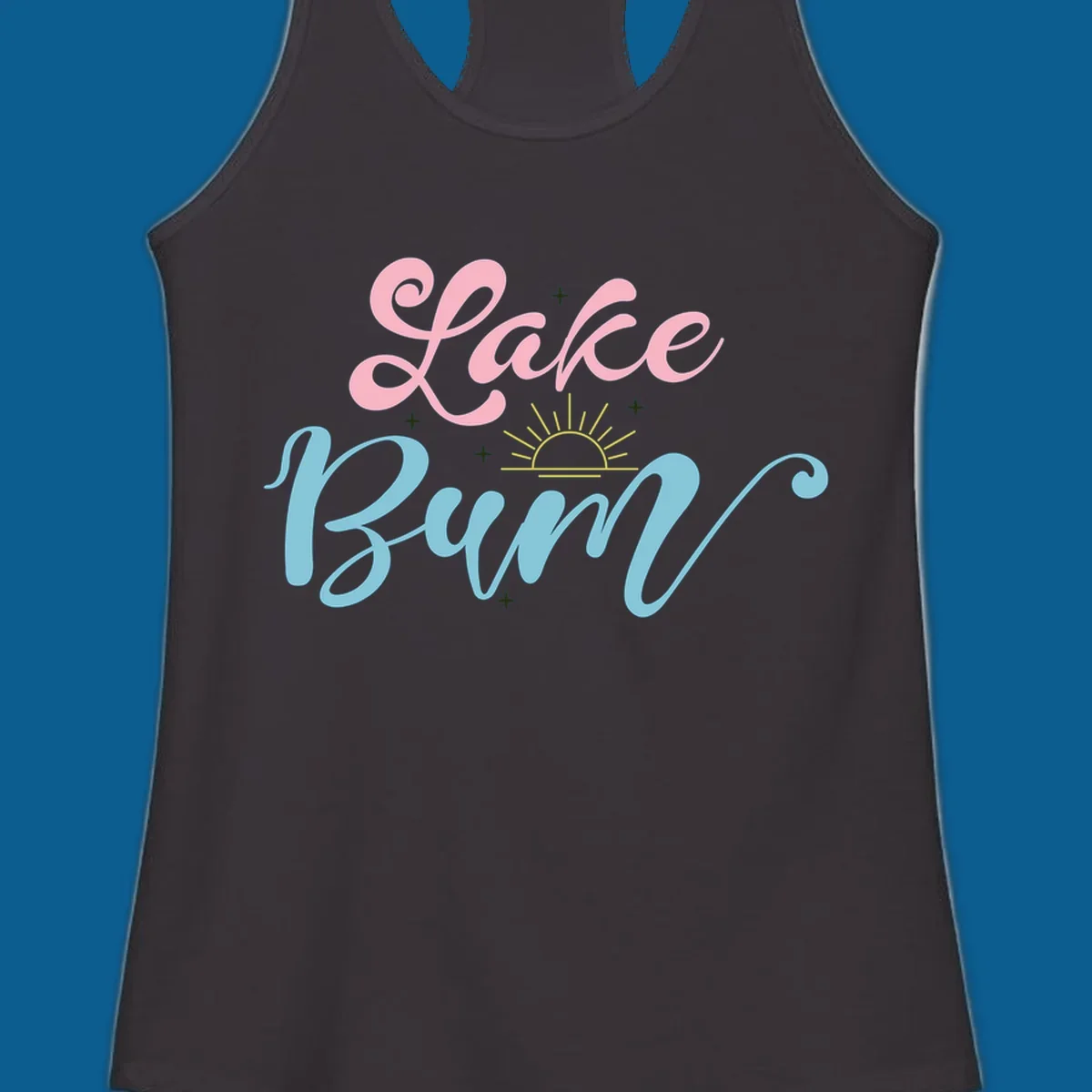 Lake Bum text design with a sunset graphic, in pink and blue script.