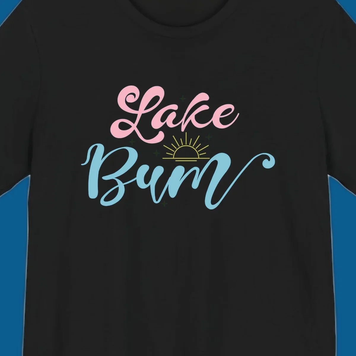 Lake Bum text design with a sunset graphic, in pink and blue script.