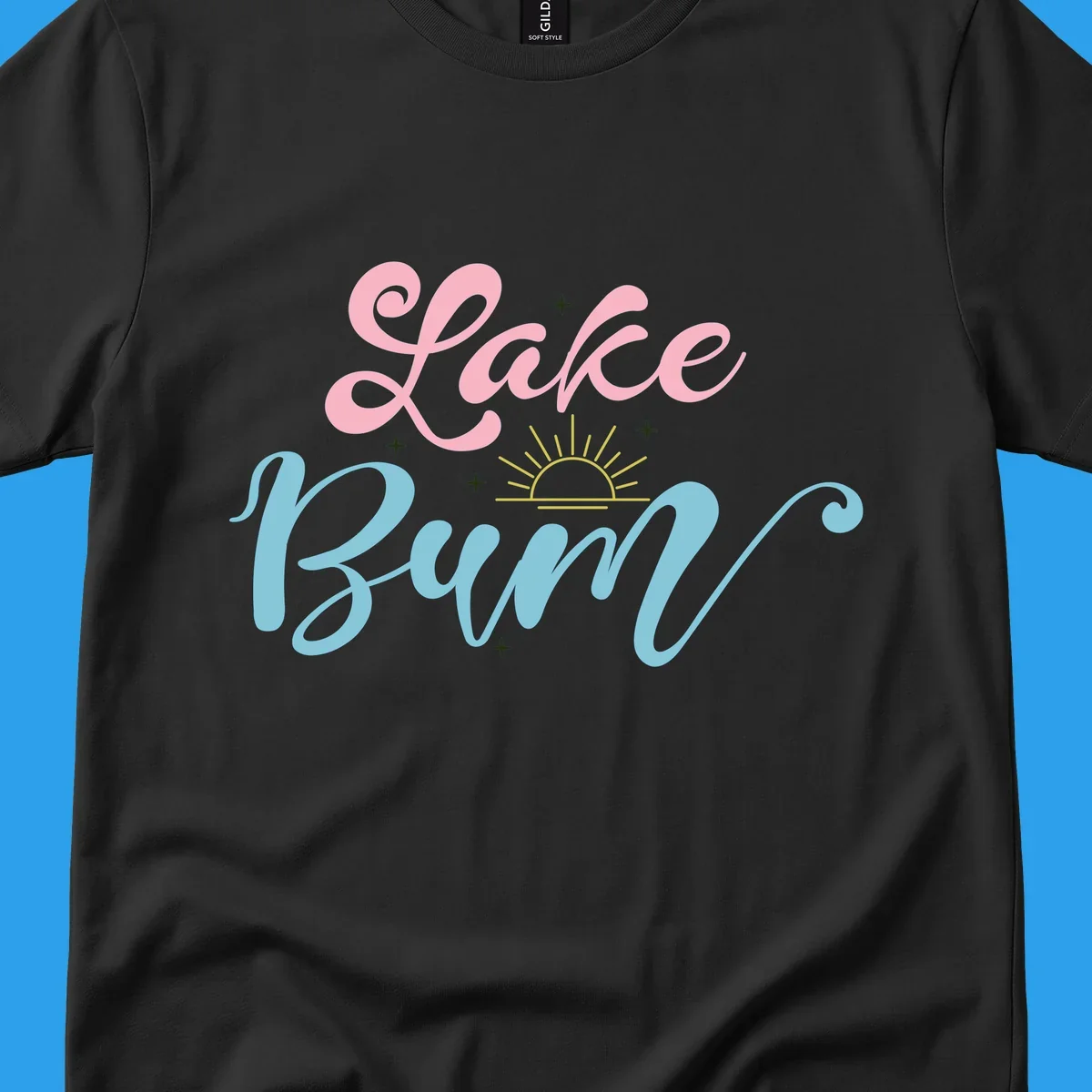 Lake Bum text design with a sunset graphic, in pink and blue script.
