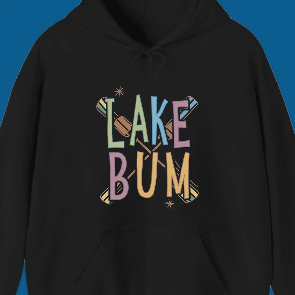 Lake Bum text with crossed oars and starbursts in colorful hand-drawn lettering.