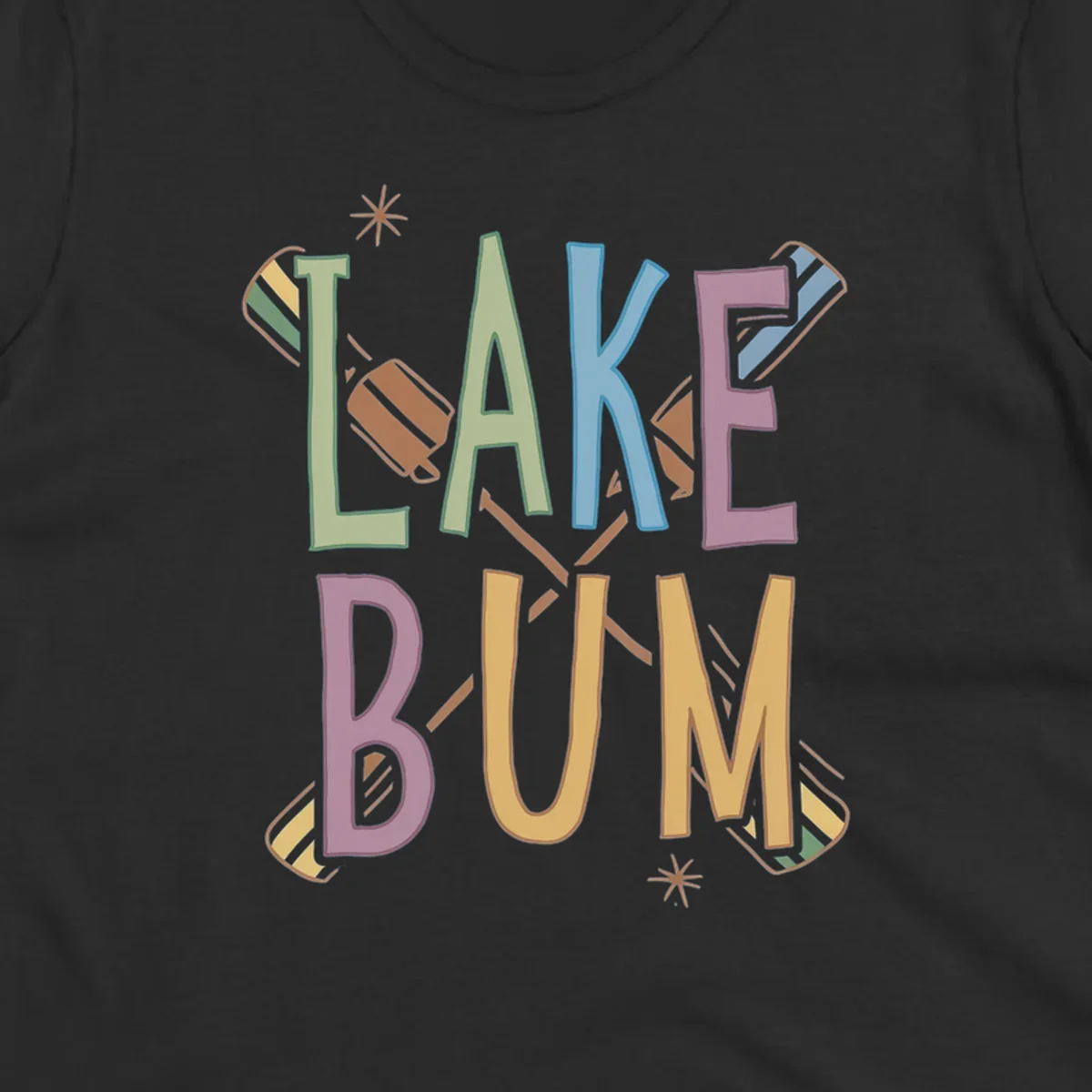 Lake Bum text with crossed oars and starbursts in colorful hand-drawn lettering.