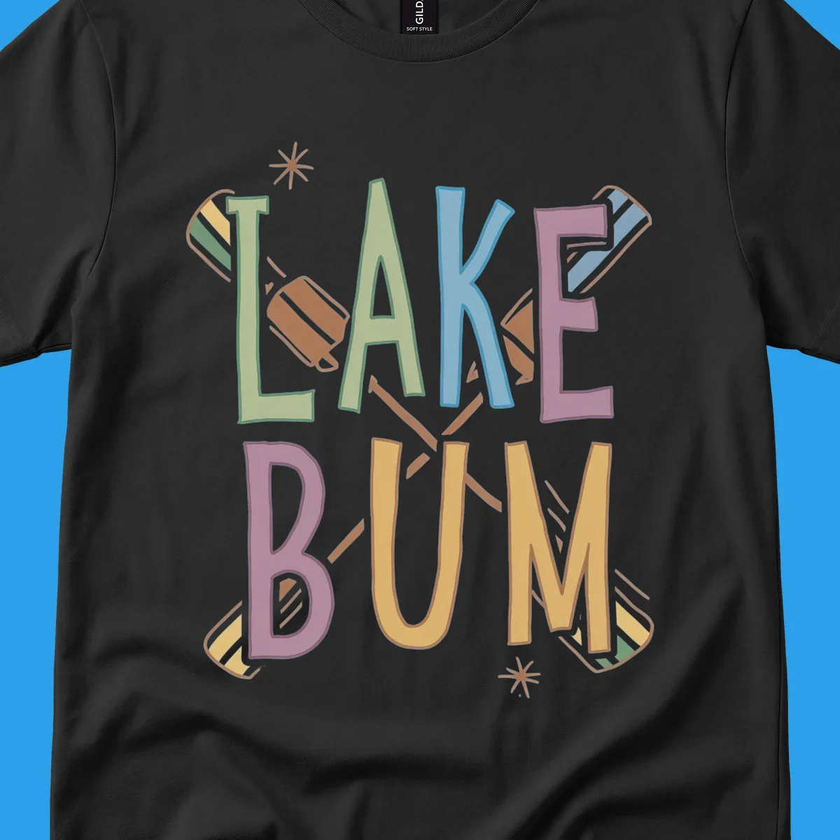 Lake Bum text with crossed oars and starbursts in colorful hand-drawn lettering.