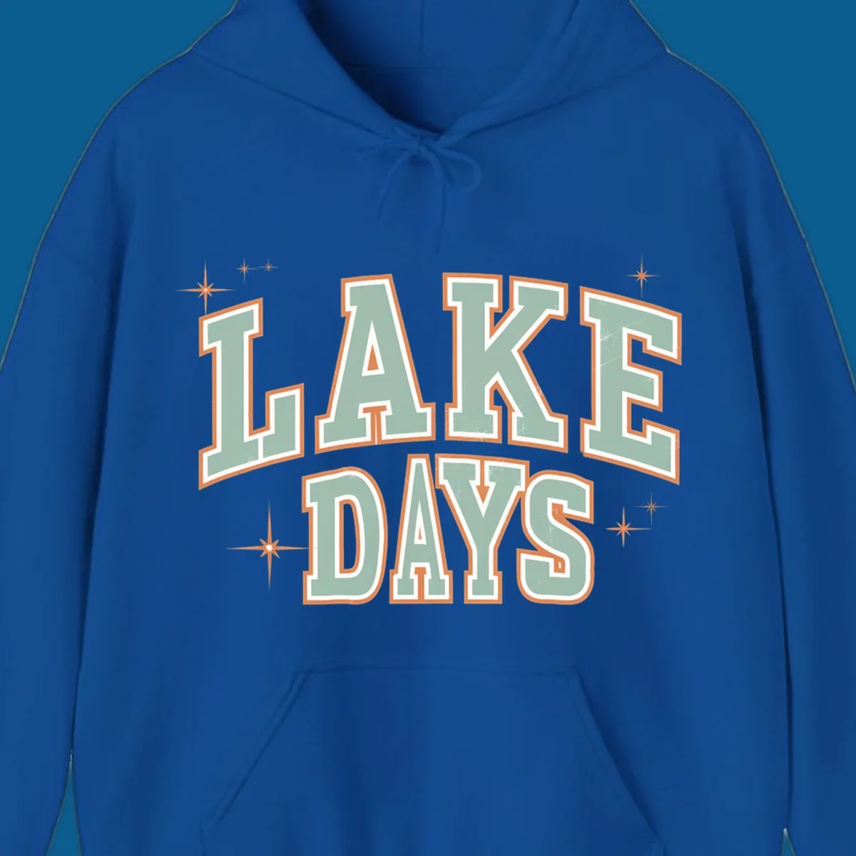 Retro varsity style LAKE DAYS text with starbursts graphic.