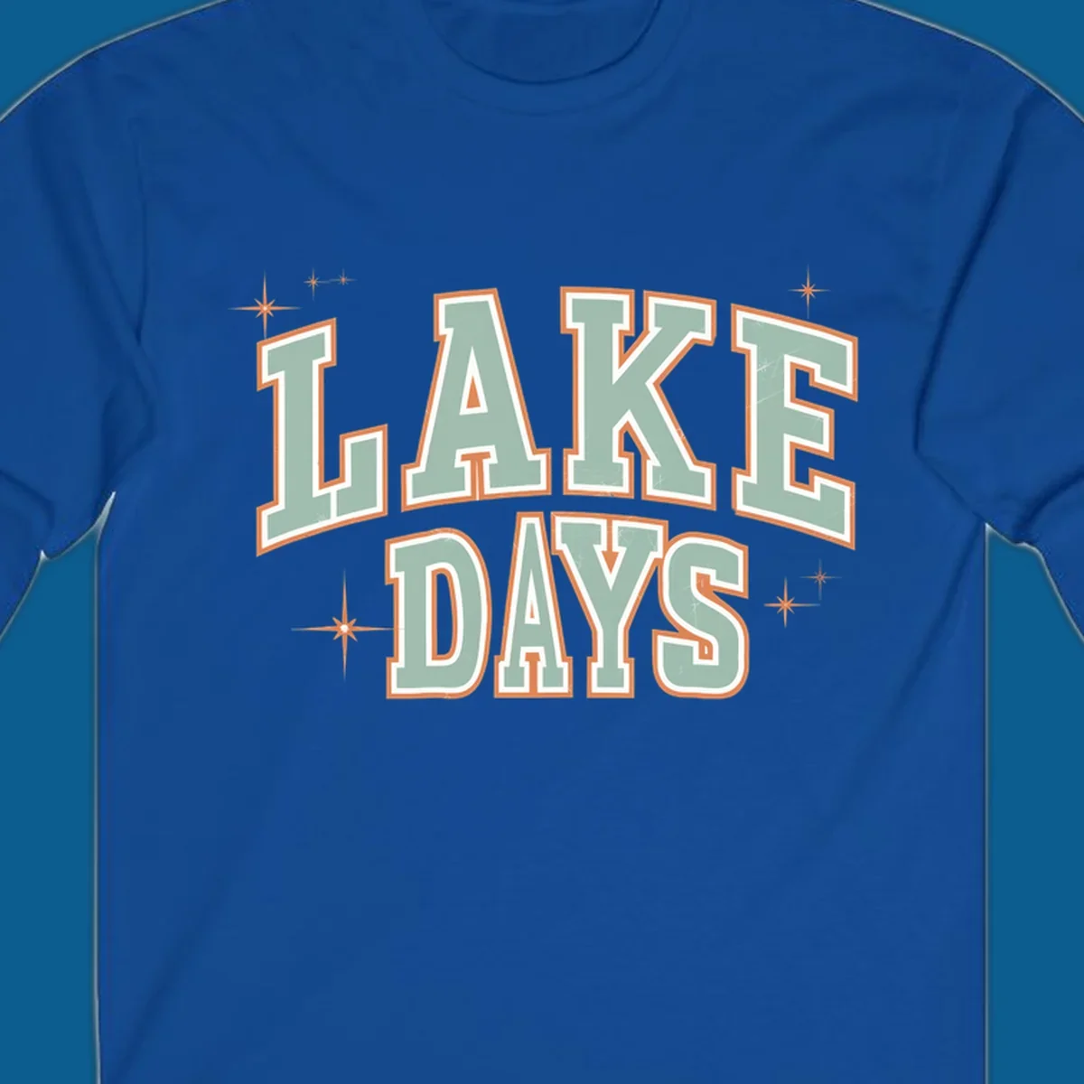 Retro varsity style LAKE DAYS text with starbursts graphic.
