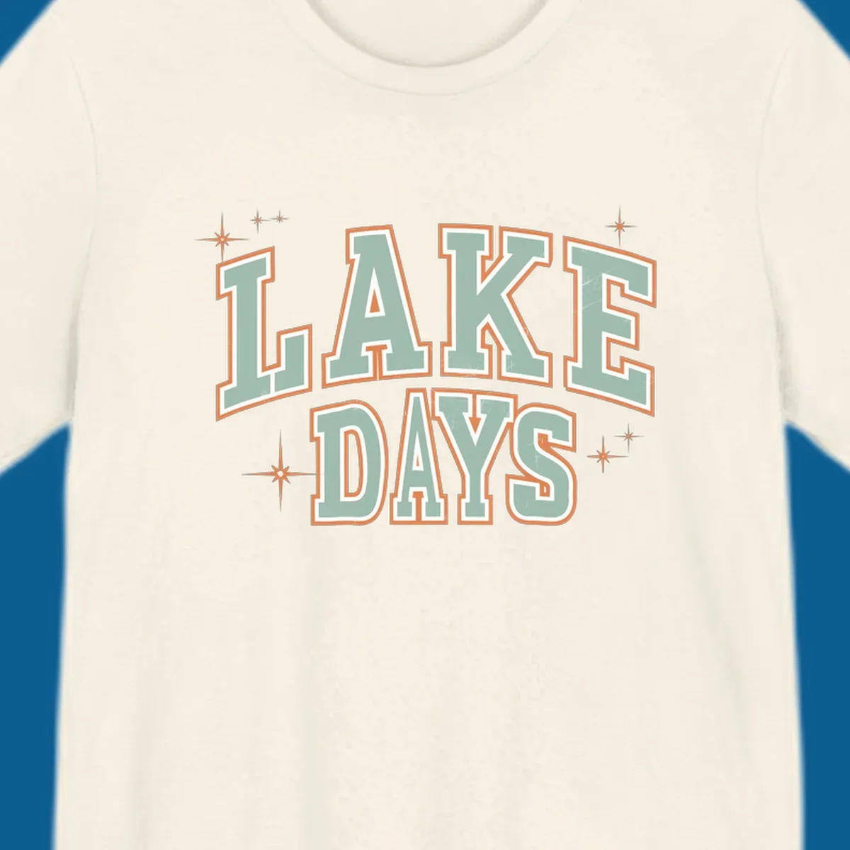 Retro varsity style LAKE DAYS text with starbursts graphic.