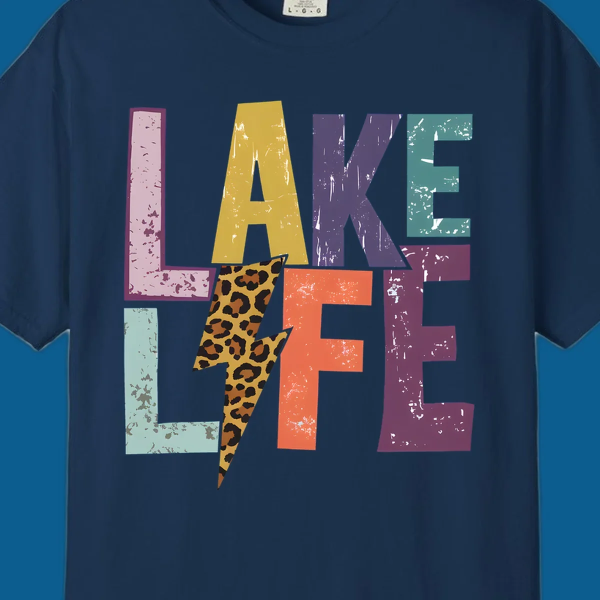 Distressed letters spelling LAKE LIFE with a leopard print lightning bolt, lake-life-style.