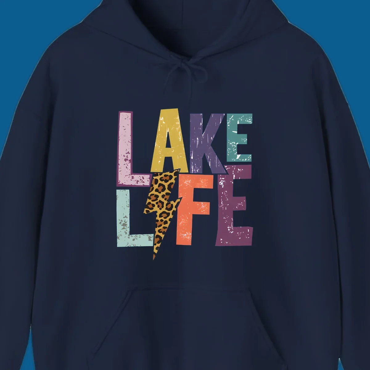 Distressed letters spelling LAKE LIFE with a leopard print lightning bolt, lake-life-style.