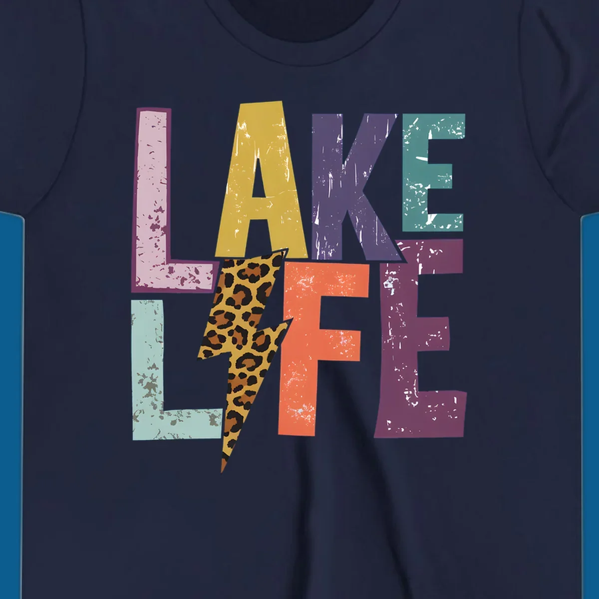 Distressed letters spelling LAKE LIFE with a leopard print lightning bolt, lake-life-style.