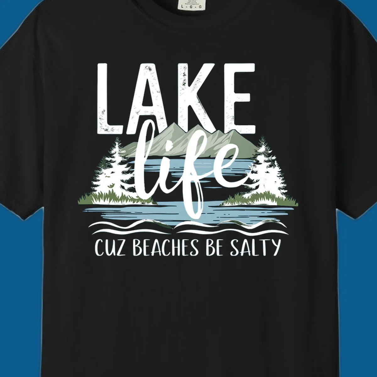 Lake life text with mountains, trees, and water; cuz beaches be salty. Lake-life-salty design.