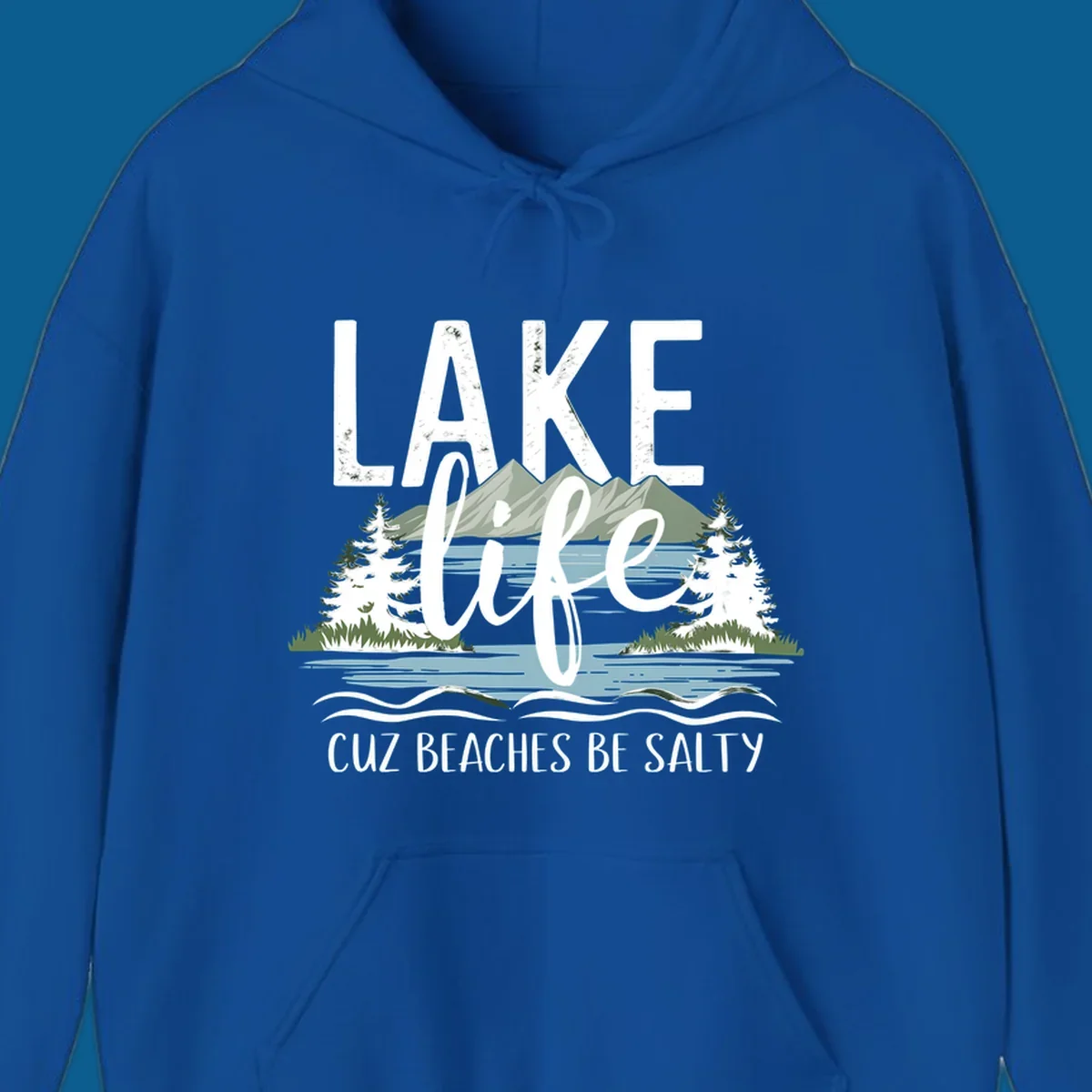 Lake life text with mountains, trees, and water; cuz beaches be salty. Lake-life-salty design.