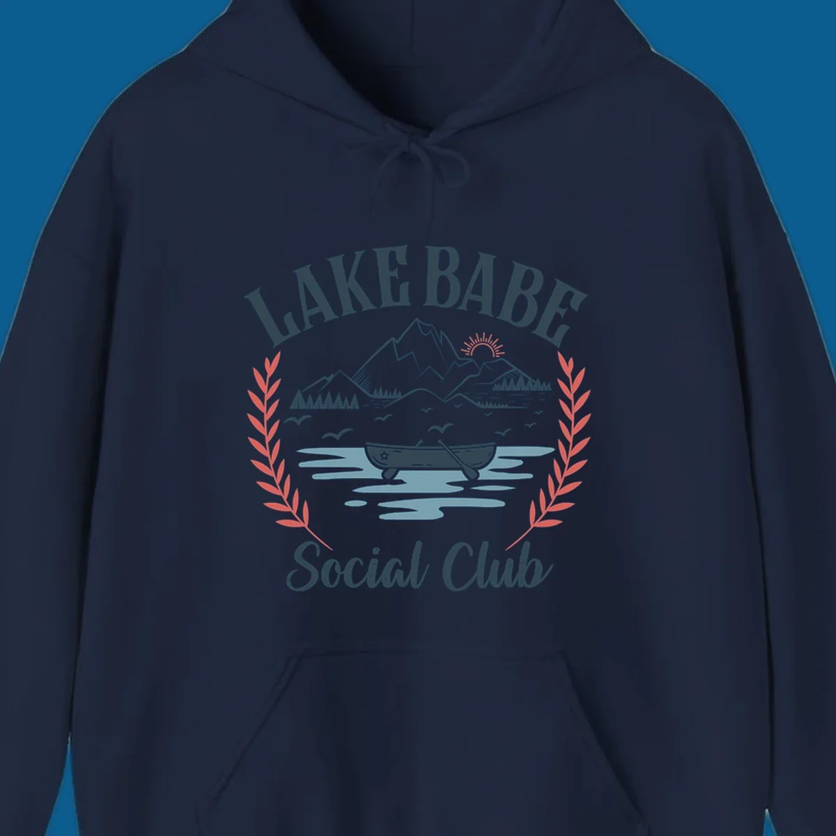 Lake Babe Social Club illustration with mountains, canoe, sun, and birds.
