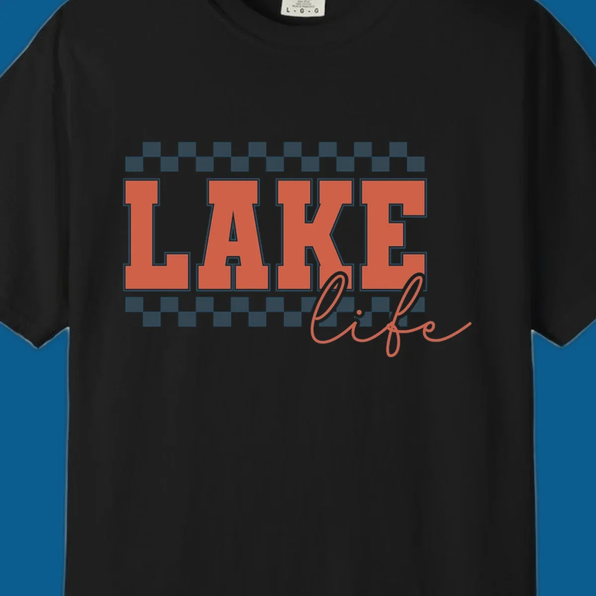 Coral block letters spelling LAKE with script "life" below, bordered by checkerboard. Lake life style.