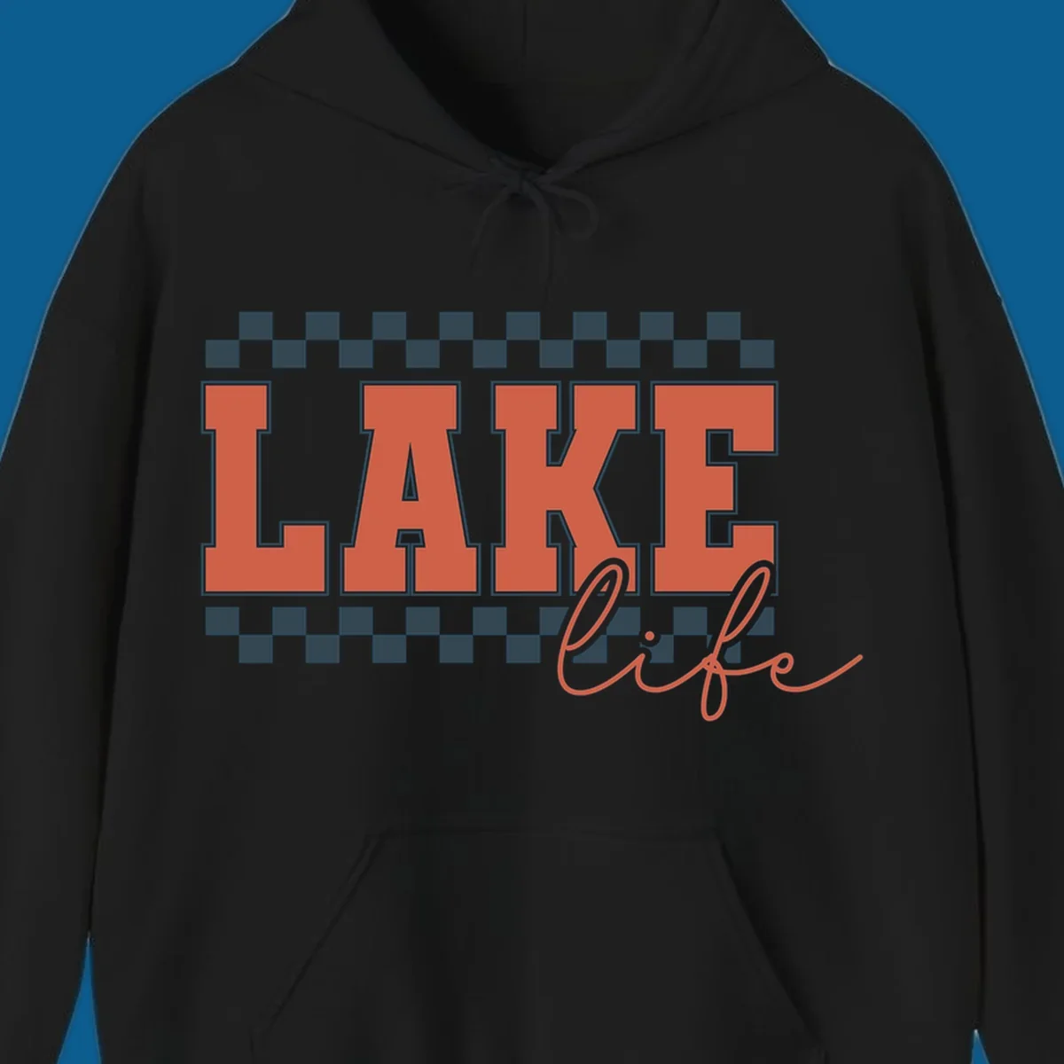 Coral block letters spelling LAKE with script "life" below, bordered by checkerboard. Lake life style.