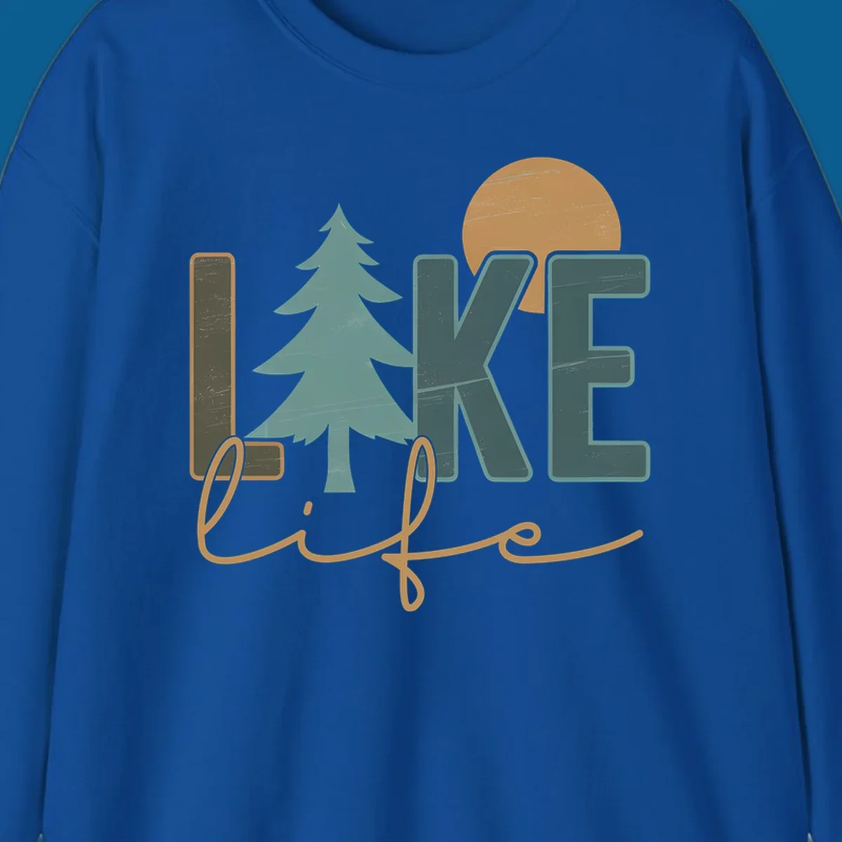 Retro lake life design with text, pine tree, and sun.