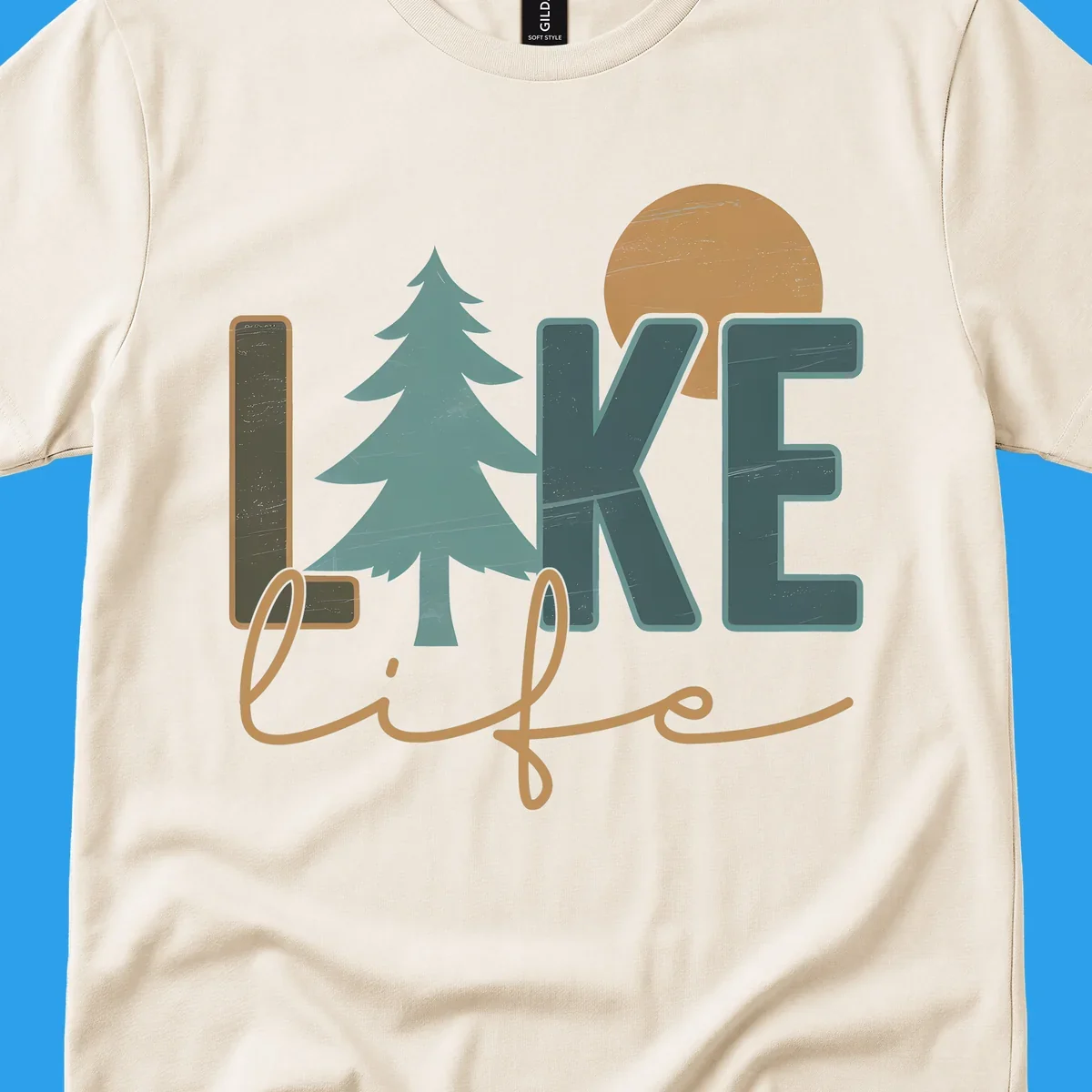 Retro lake life design with text, pine tree, and sun.
