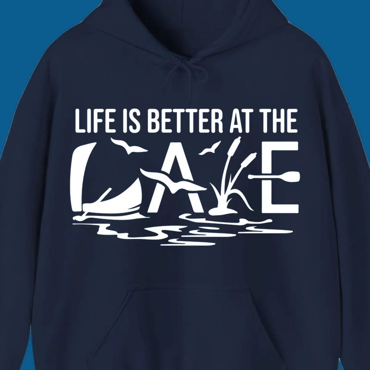 Life Is Better At The Lake design with sailboat, birds, reeds, paddle, and text.