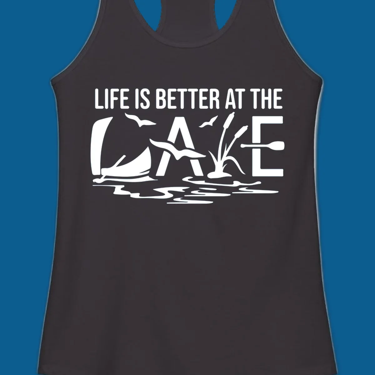 Life Is Better At The Lake design with sailboat, birds, reeds, paddle, and text.