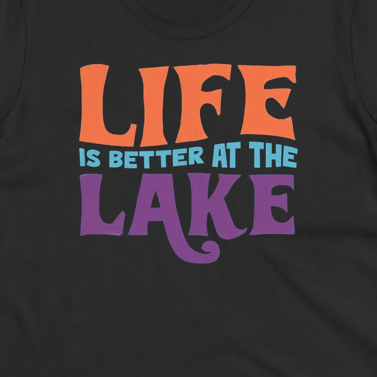 Retro typography design stating "LIFE IS BETTER AT THE LAKE" in orange, teal, and purple.