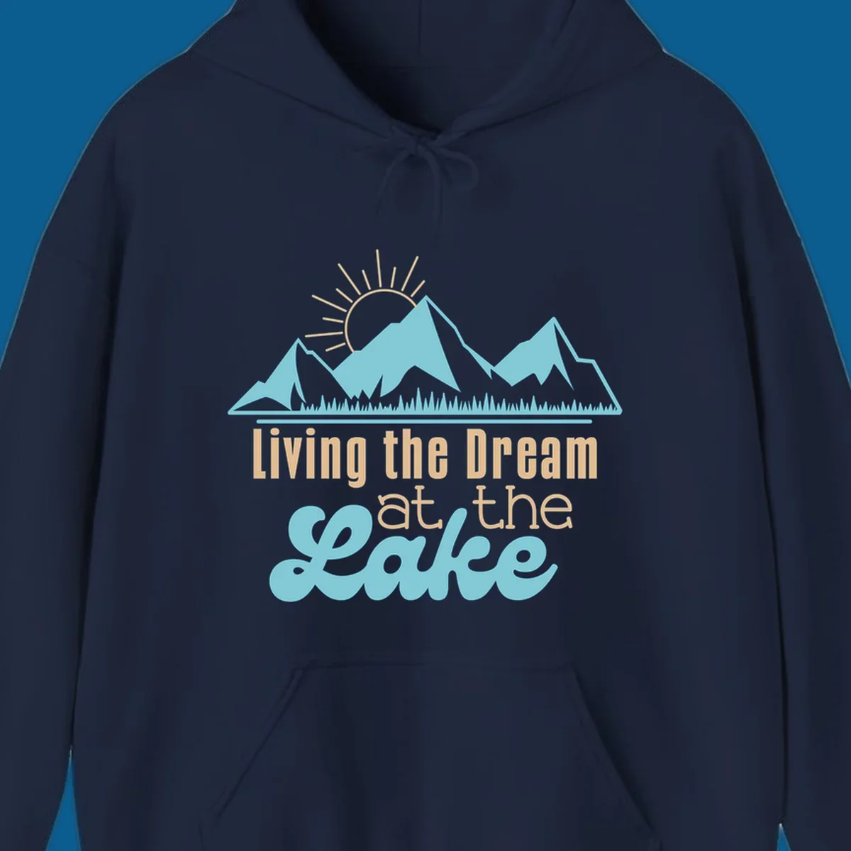 Scenic mountain range with sun and text 'Living the Dream at the Lake'.