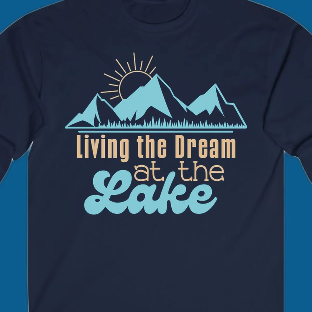 Scenic mountain range with sun and text 'Living the Dream at the Lake'.