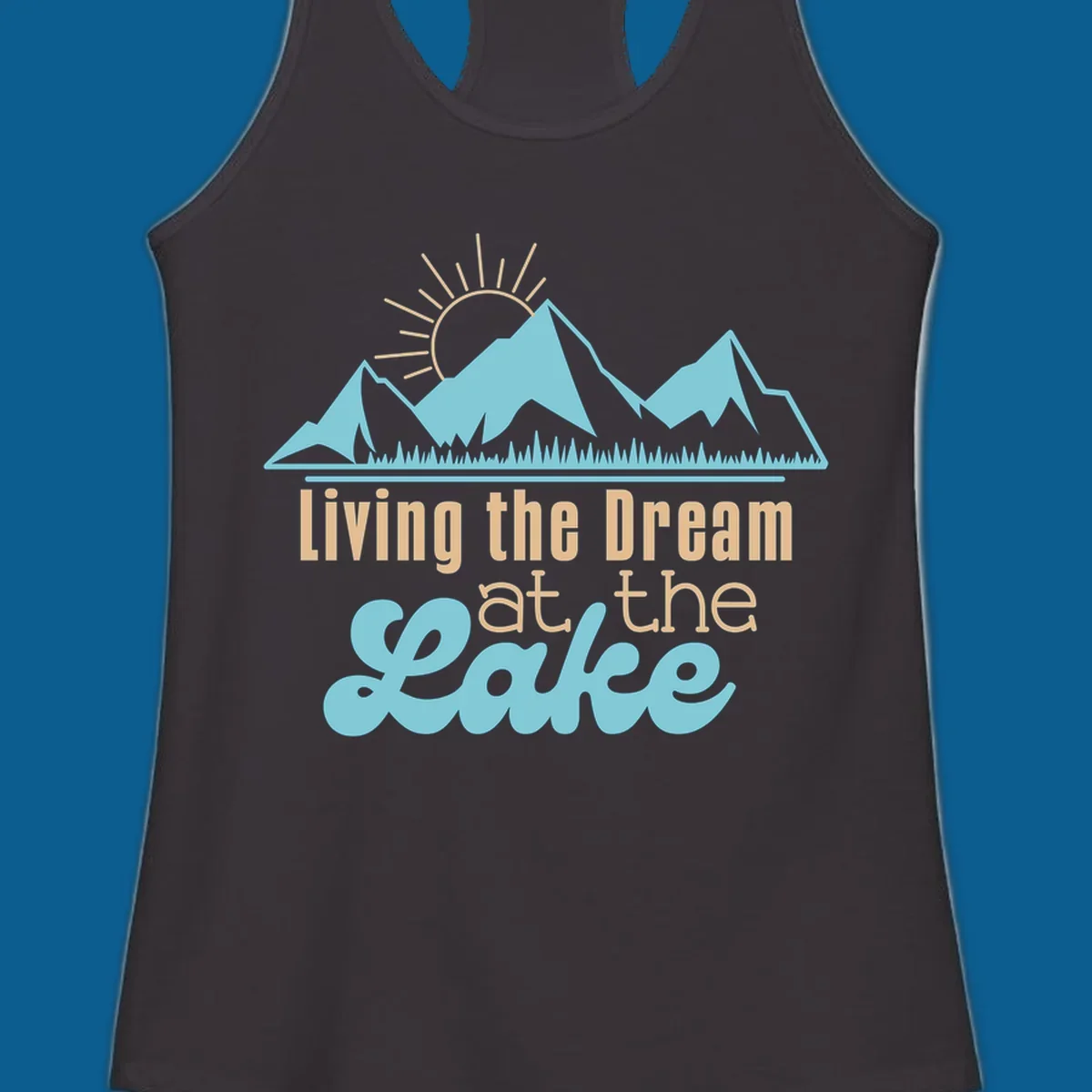 Scenic mountain range with sun and text 'Living the Dream at the Lake'.