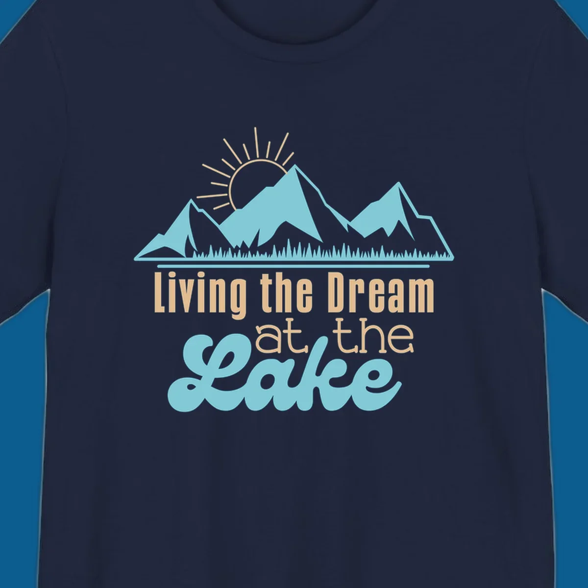 Scenic mountain range with sun and text 'Living the Dream at the Lake'.