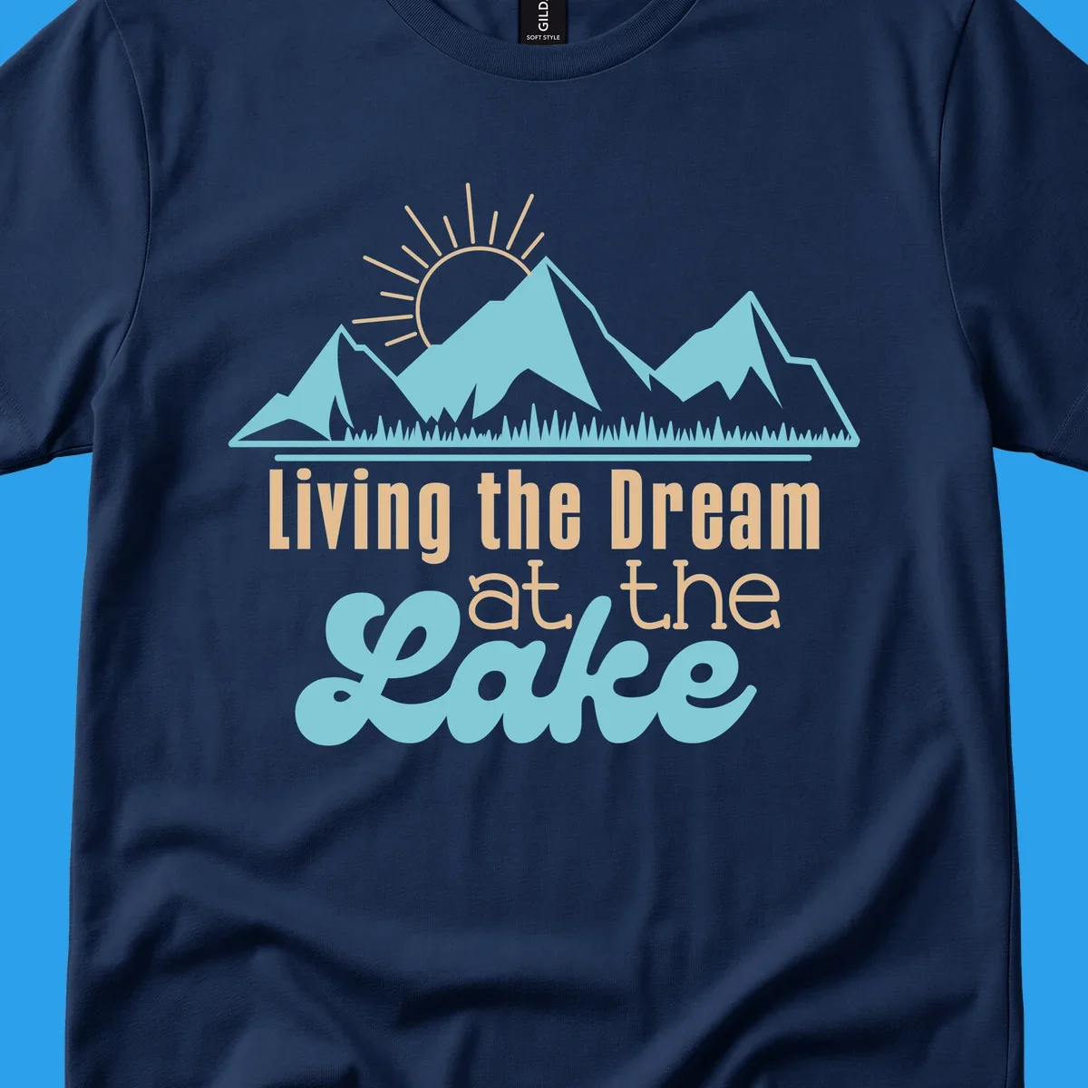 Scenic mountain range with sun and text 'Living the Dream at the Lake'.