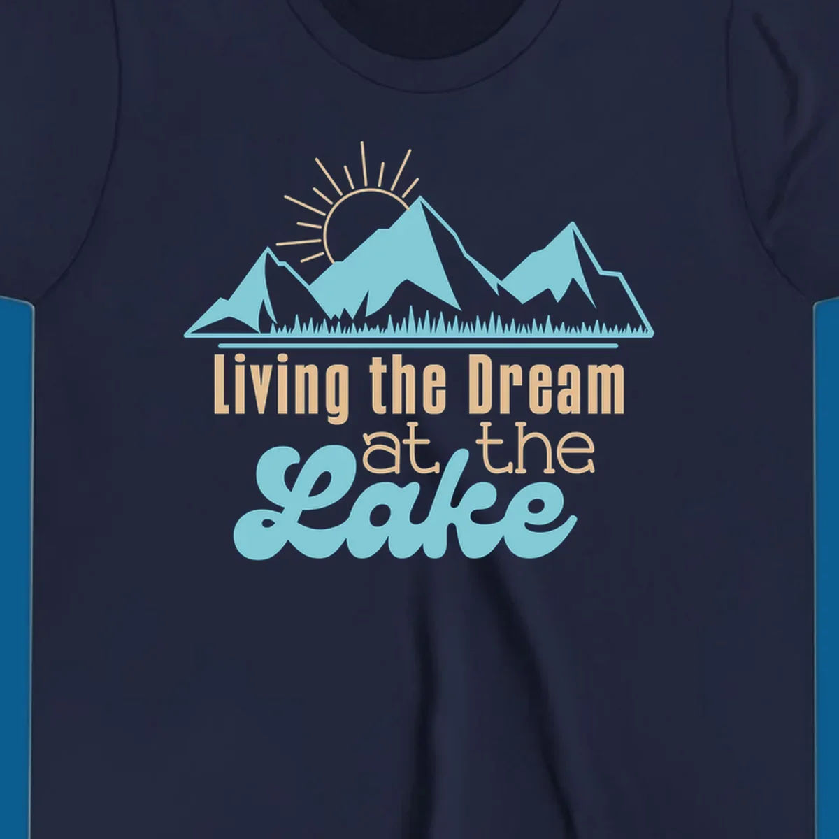 Scenic mountain range with sun and text 'Living the Dream at the Lake'.