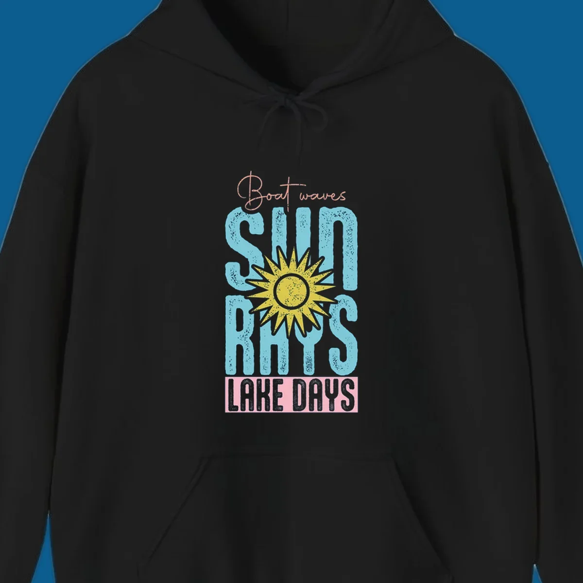 Boat waves sun rays lake days text design with a distressed sun illustration.