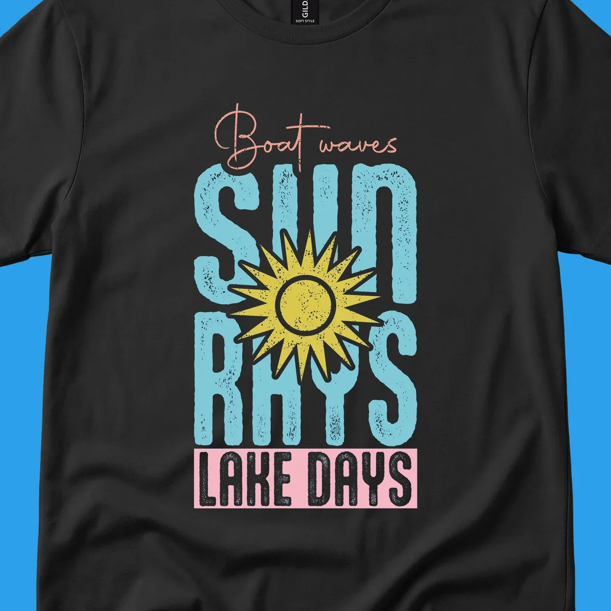 Boat waves sun rays lake days text design with a distressed sun illustration.