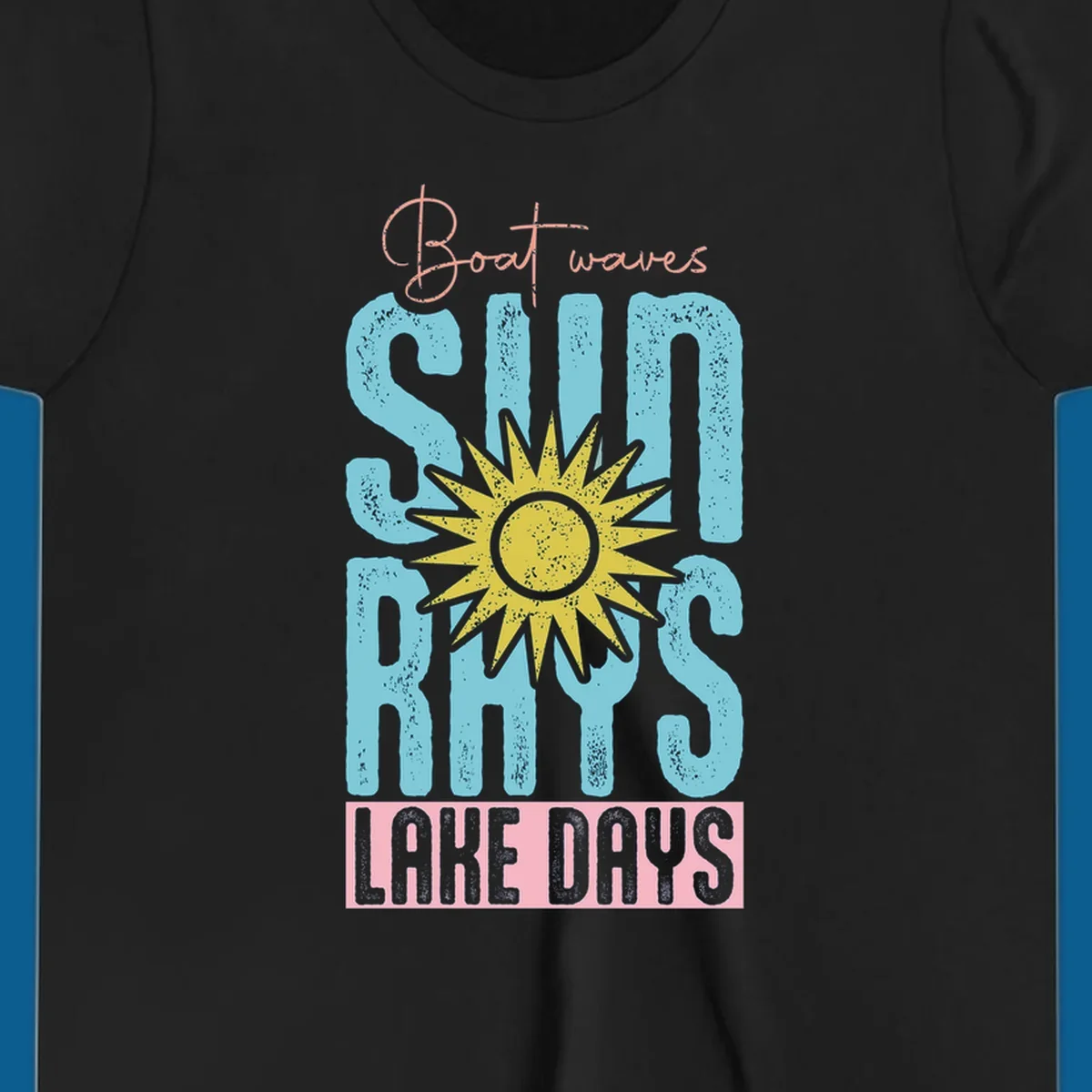 Boat waves sun rays lake days text design with a distressed sun illustration.