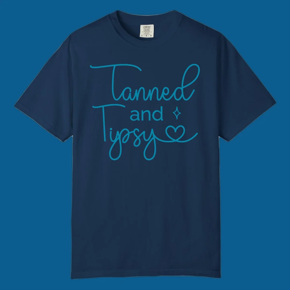 Tanned and Tipsy text with star and heart graphic
