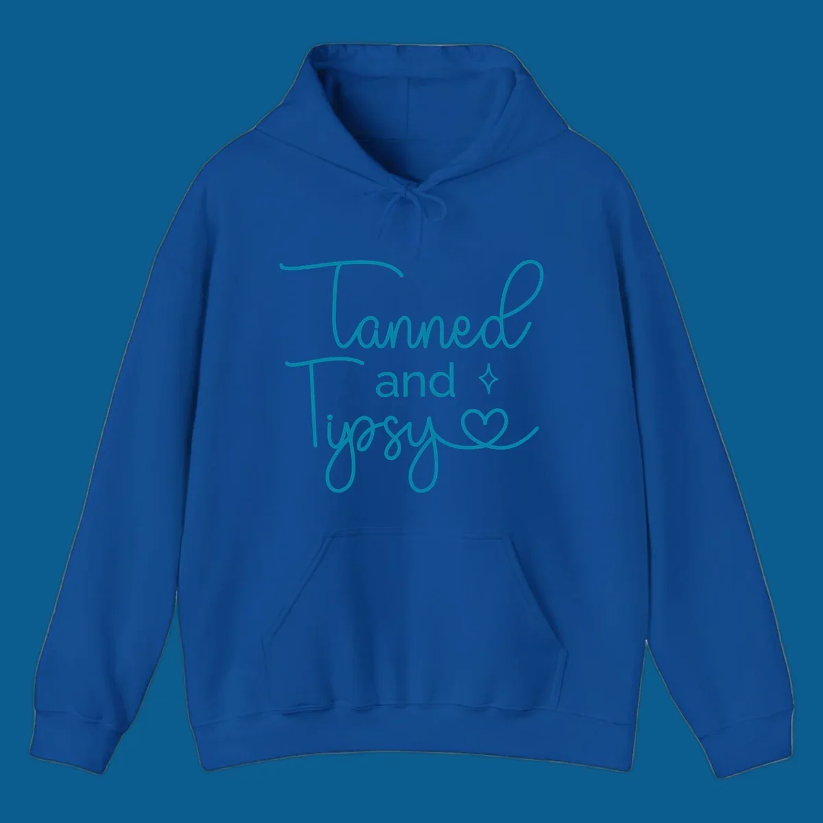 Tanned and Tipsy text with star and heart graphic